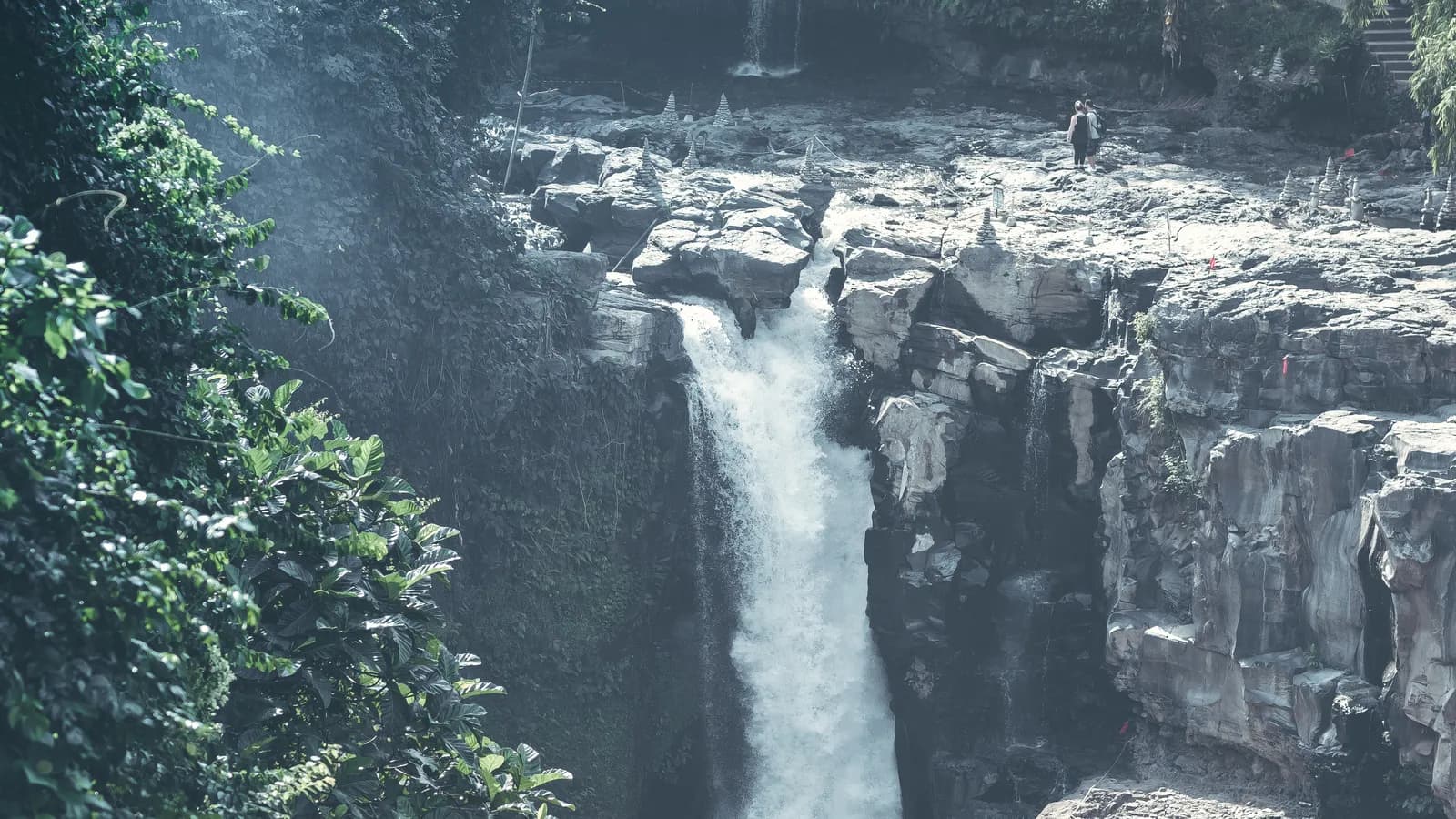 A jungle waterfall tumbling through the greenery in Bali