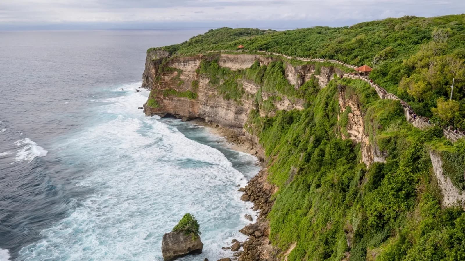 The clifftop setting of Uluwatu Temple above the Indian Ocean