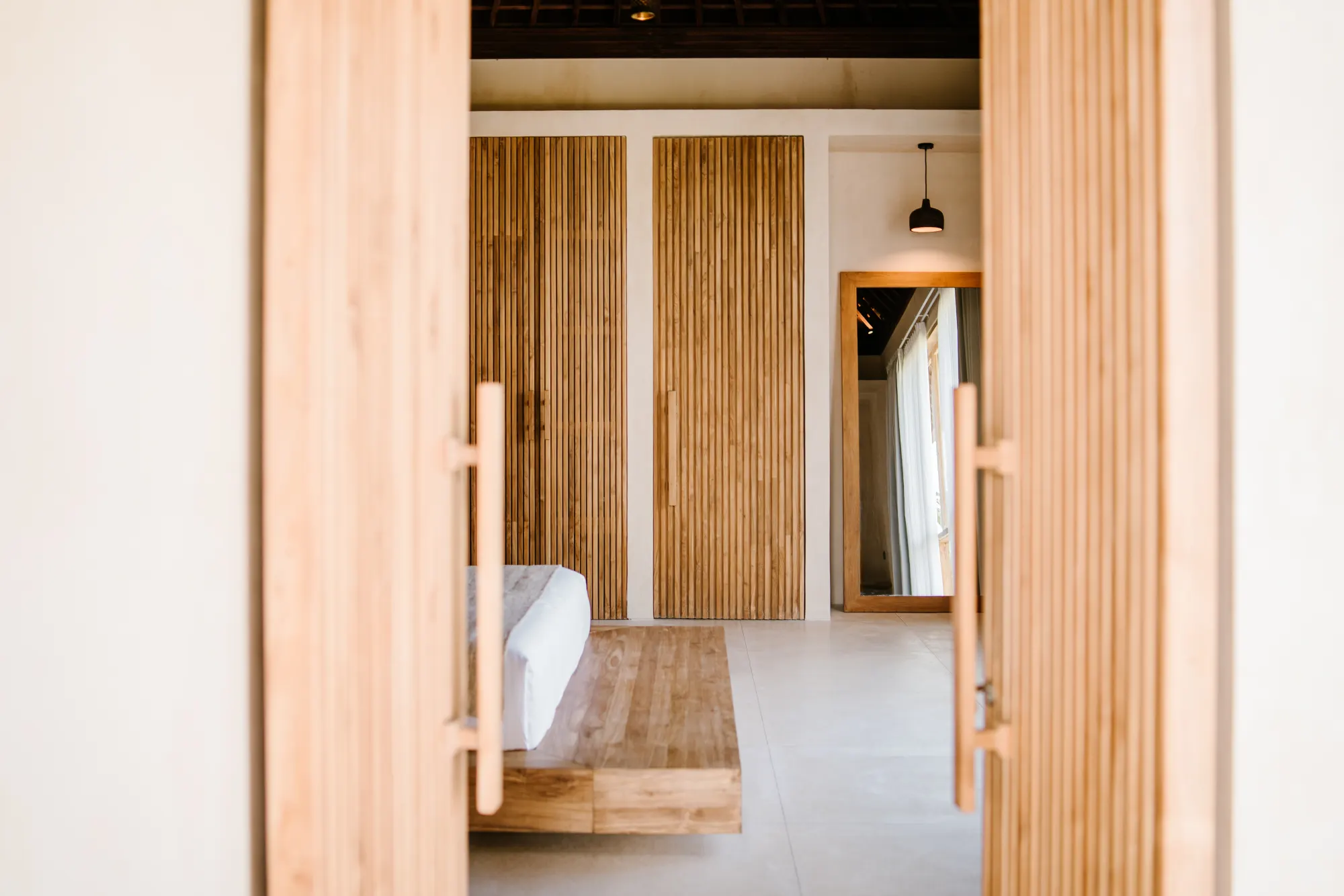 Bedroom with wooden frame and modern wall art